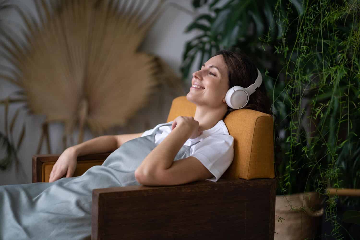 woman relaxing after taking CBD, as part of the Benefits Of CBD