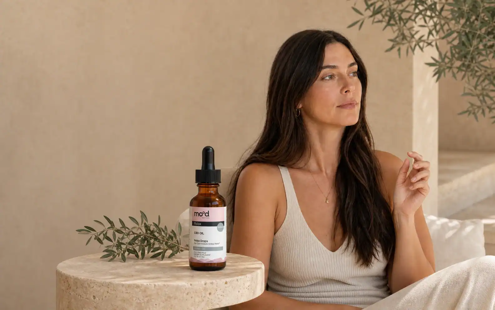 Mood Daily Bliss gummies and original packaging in a calm editorial setting